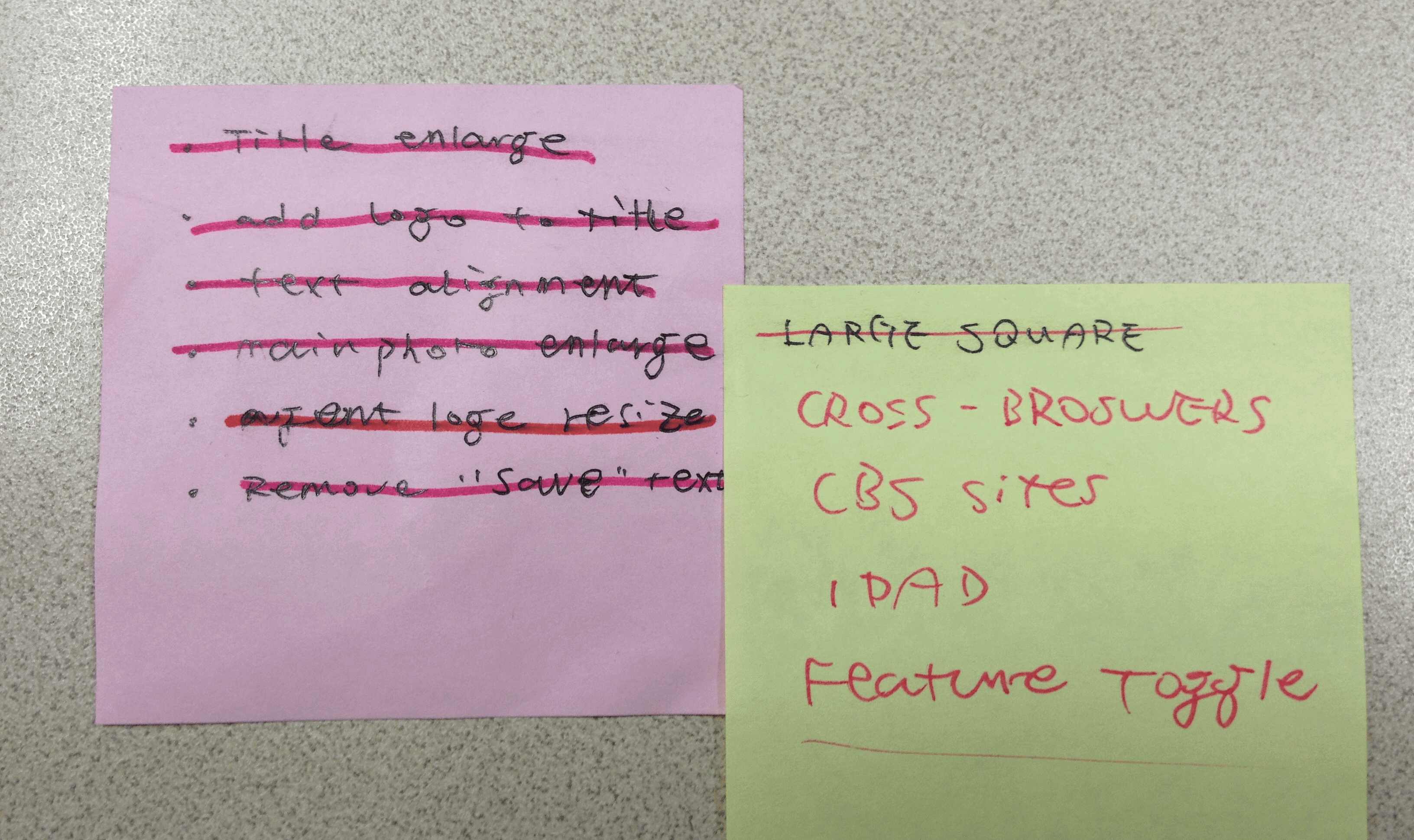 Post-it notes with tasks crossed off