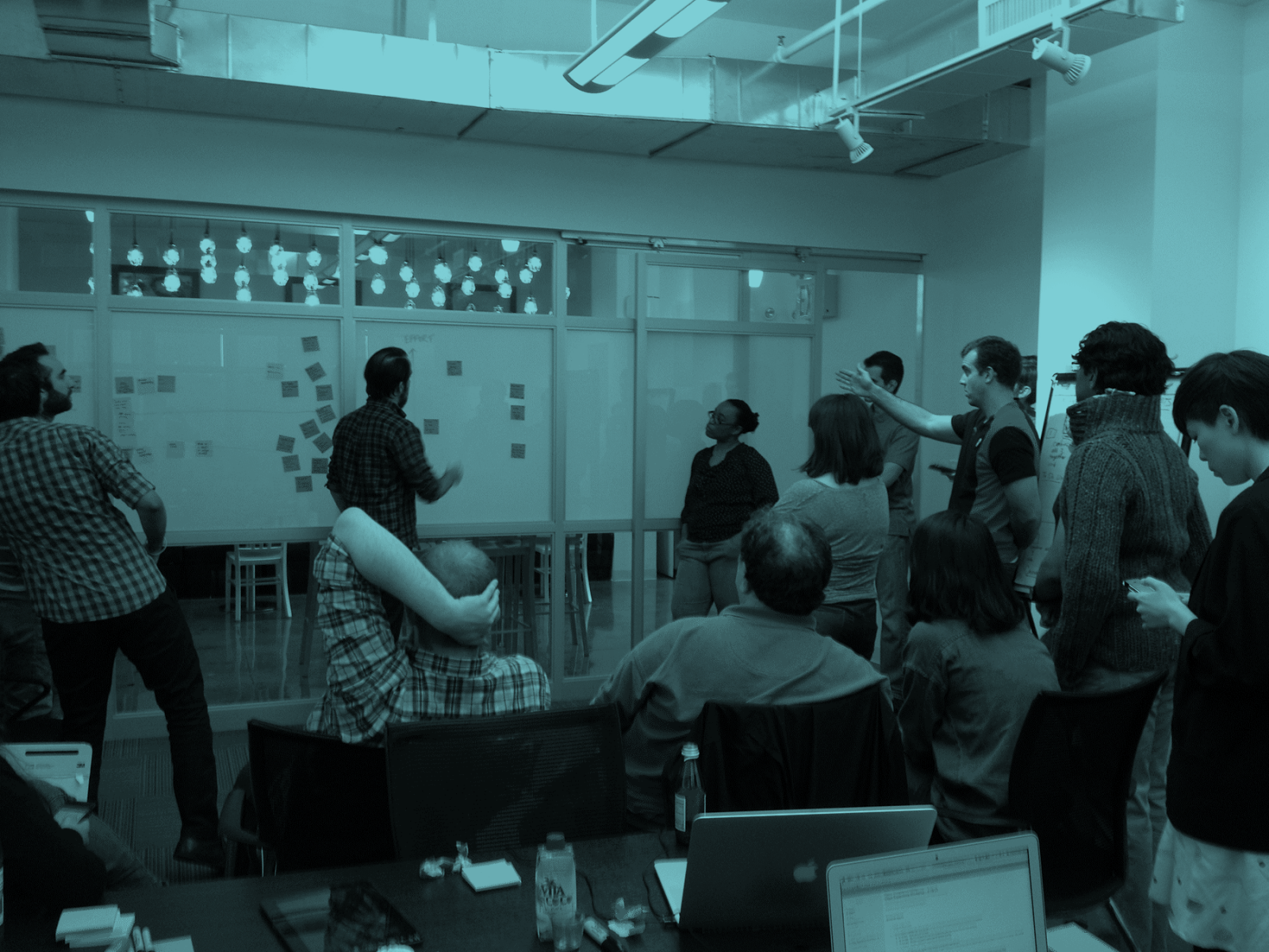 Collocate teams and create physical space to collaborate