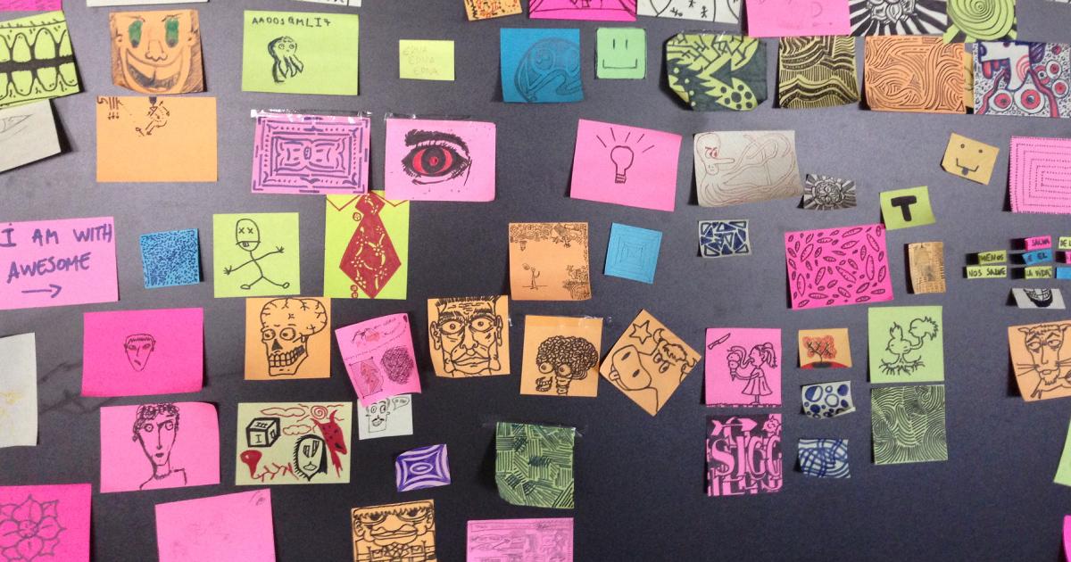 Every designer needs an outlet lots of hand drawn images stuck to a wall