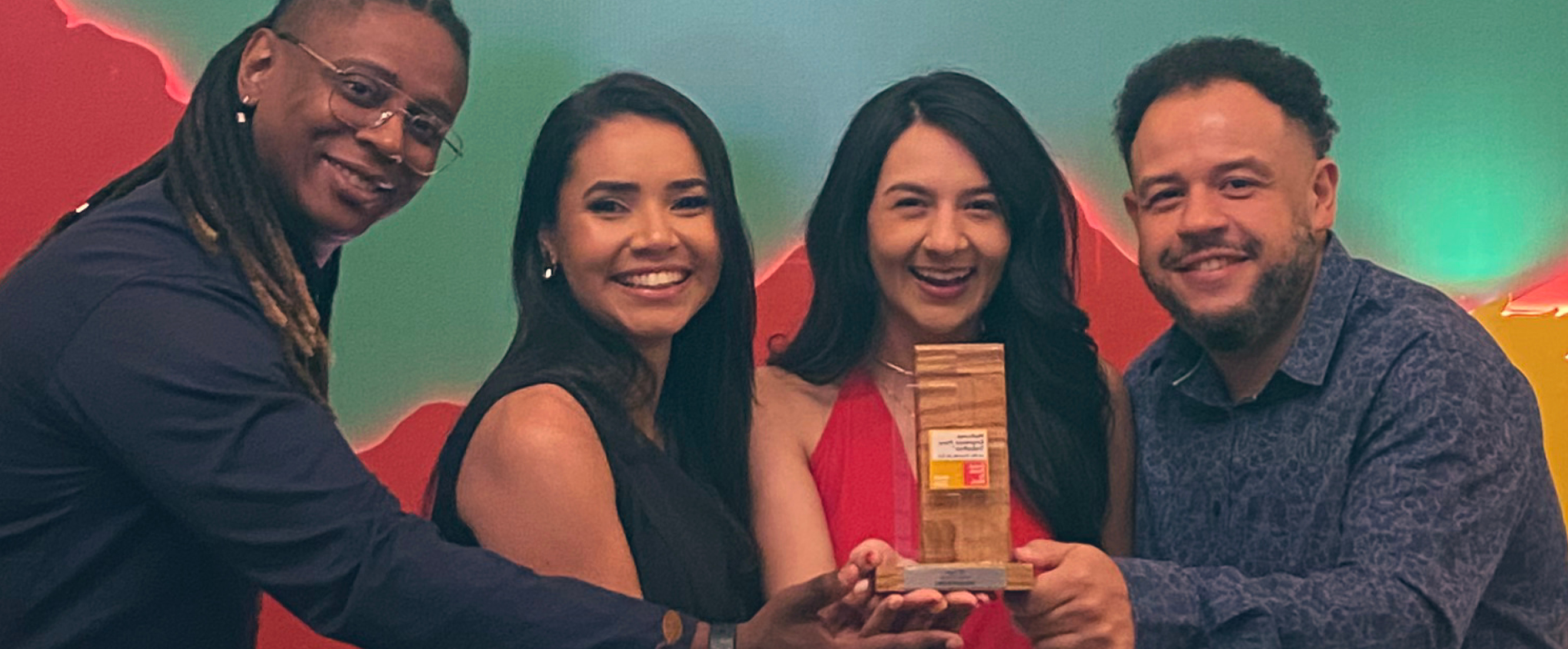 Photo of 4 Thoughtworkers smiling and holding the Great Place To Work award at an award ceremony. Photo of 4 Thoughtworkers smiling and holding the Great Place To Work award at an award ceremony.